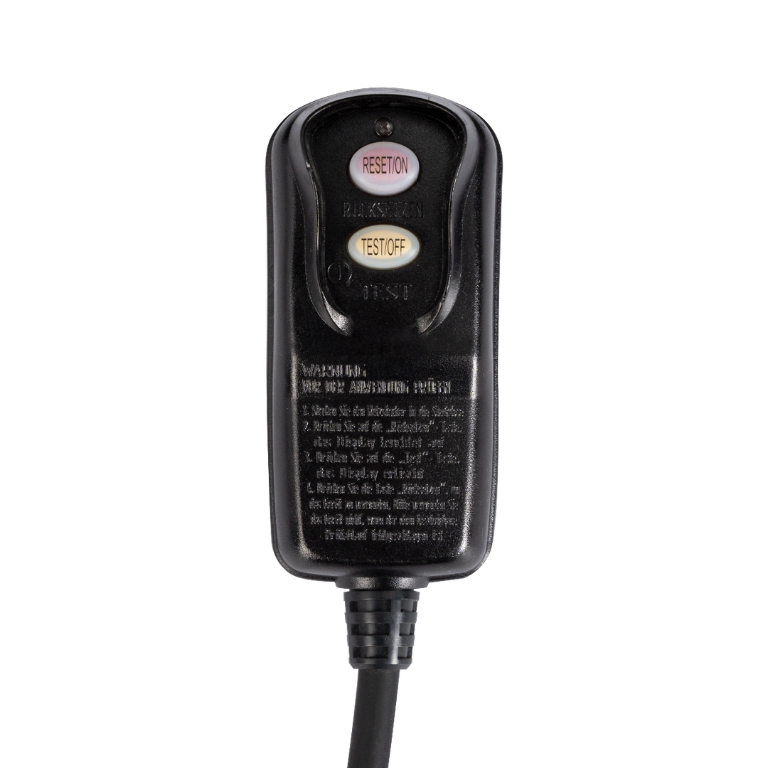 Plug for the spa with a reset/on button and a test/off button.