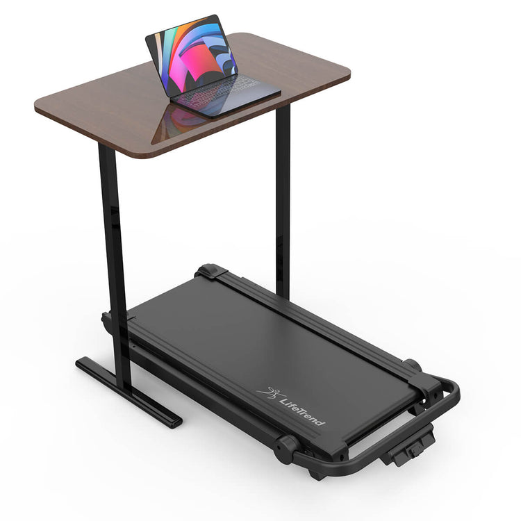 Laptop on a desk with walking treadmill under the desk.
