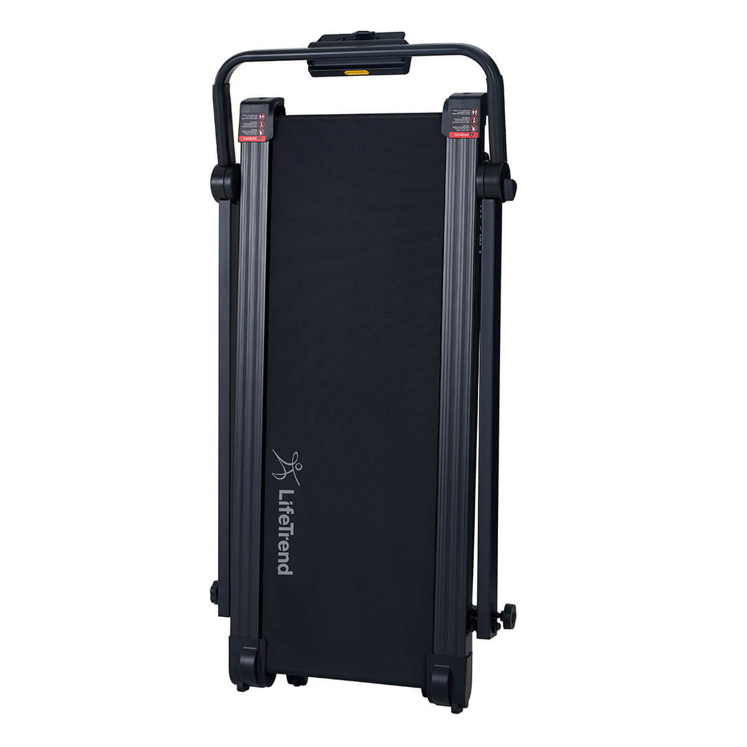 Folded up treadmill stored vertically.